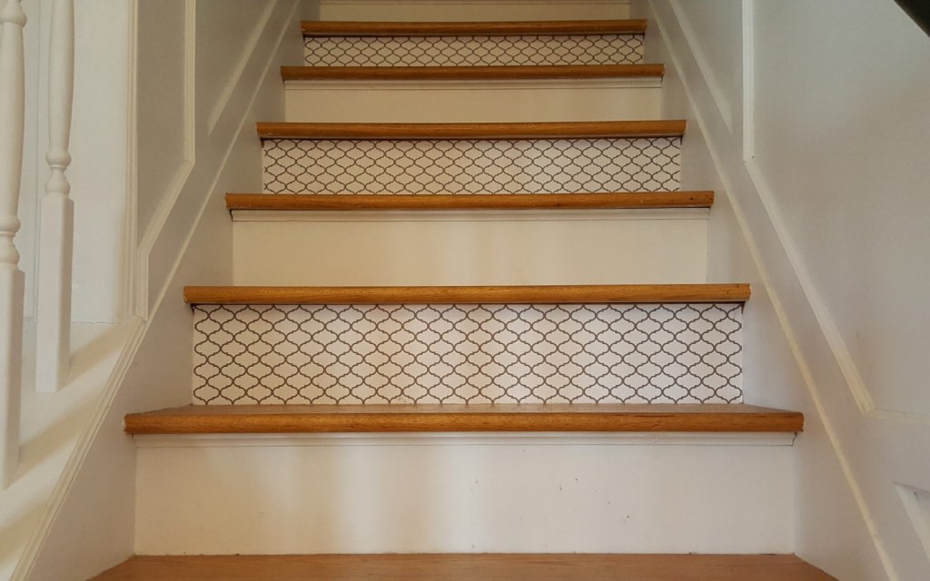 Wood stairs with stencil patterned risers