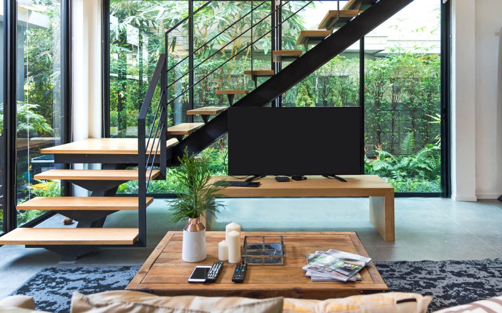 TV console under stairs