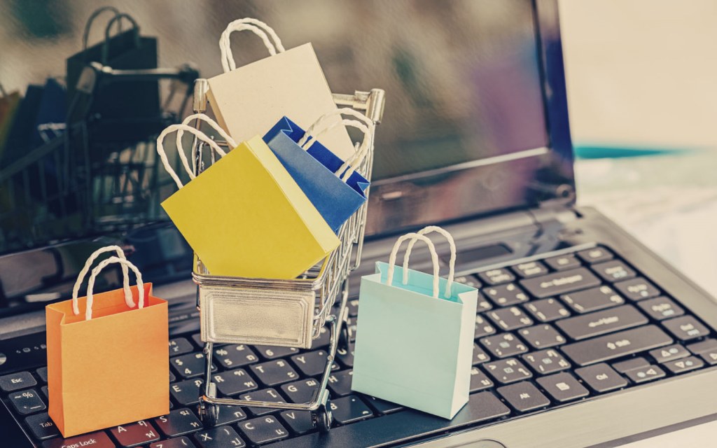 Paper shopping bags symbolizing online shopping addiction