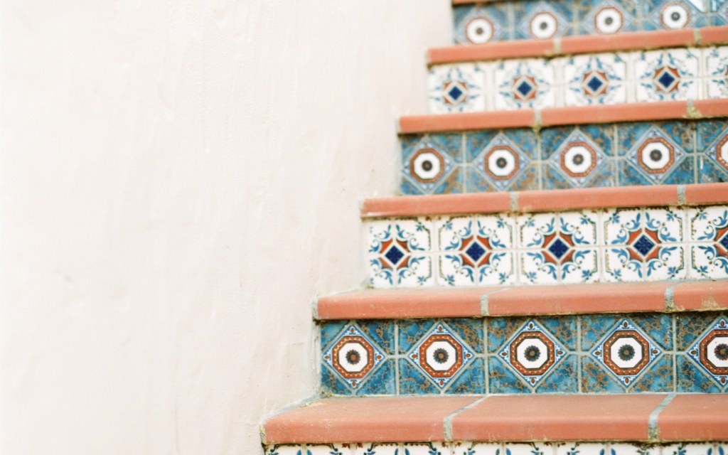 Multi-colour tiles on staircase