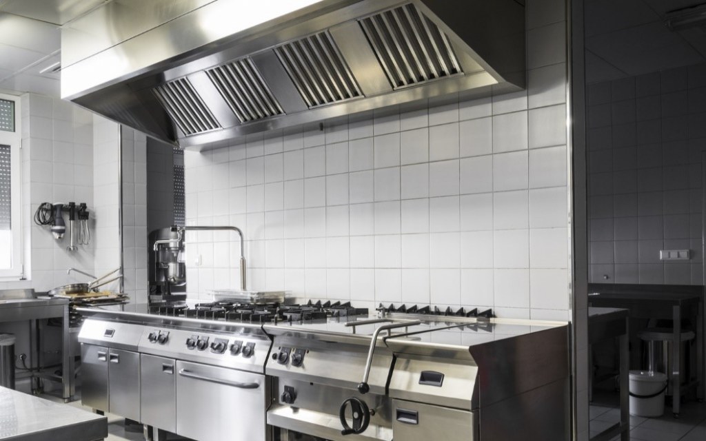 stove top and chimney of a commercial kitchen