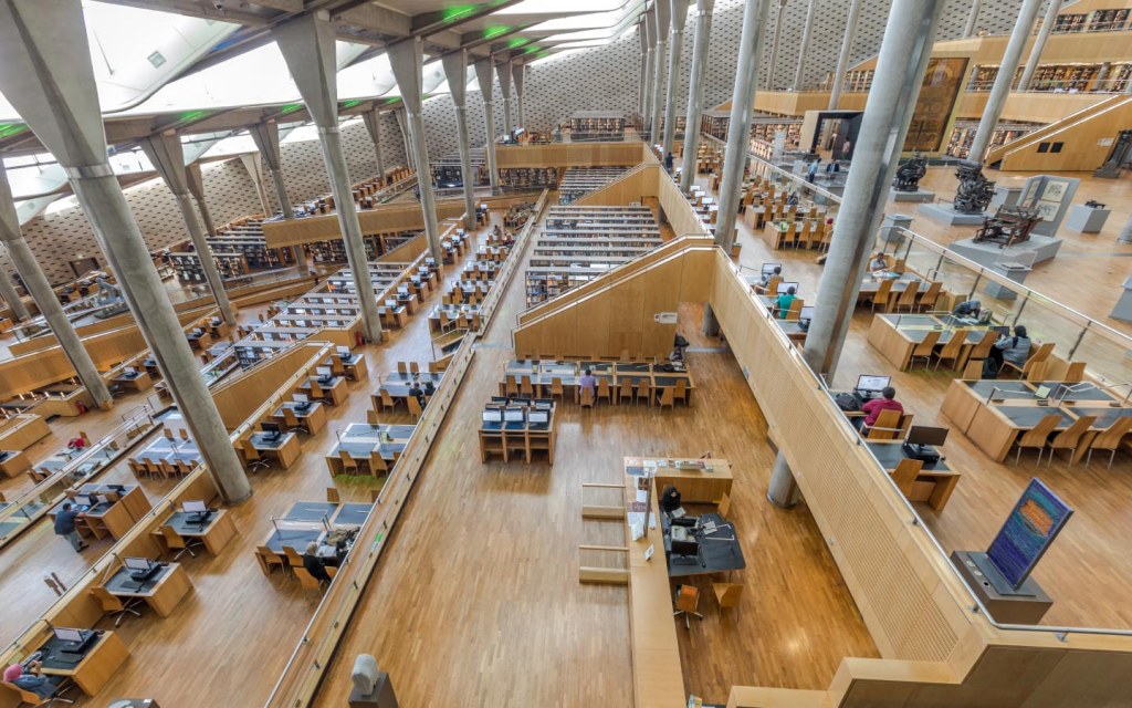 Bibliotheca Alexandrina is partially built underground with a roof that allows daylight to light the interior