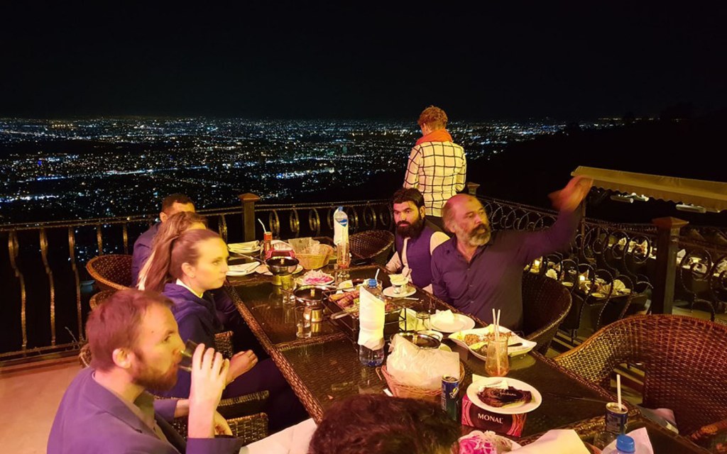 The members of British Backpacker SOciety enjoy dinner at Monal restaurant