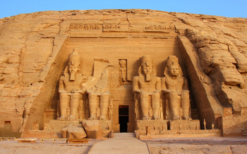 Statues of Ramses II guard the door at the Great Temple