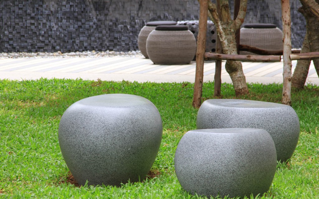 Use flat stones as seats in your garden
