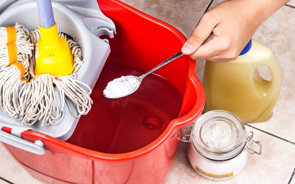 The uses of baking soda also include cleaning up tough stains from your floors