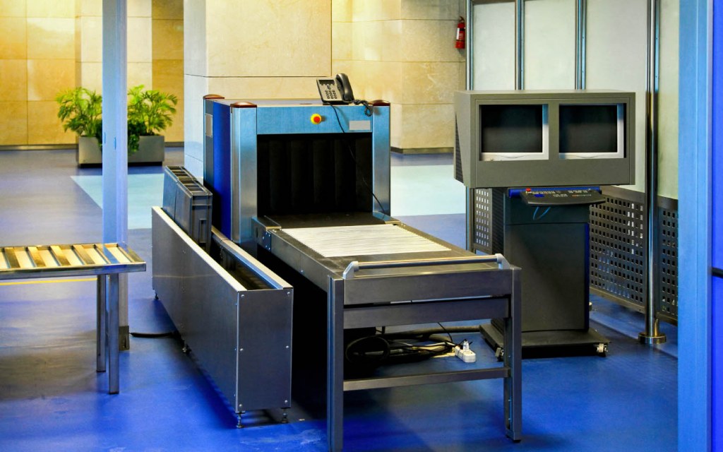 Airport security check with metal detector