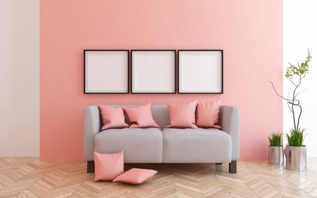 A pink and grey minimalist living room