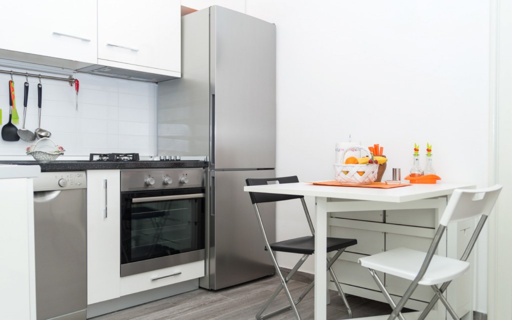 Keep the privacy of a closed kitchen and the informality of an open one with these tips