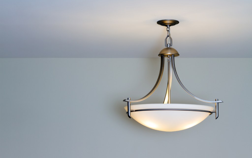 Replace your old wiring if your ceiling lights are flickering