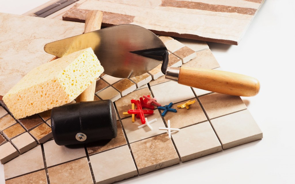 Tools required to install bathroom floor tiles