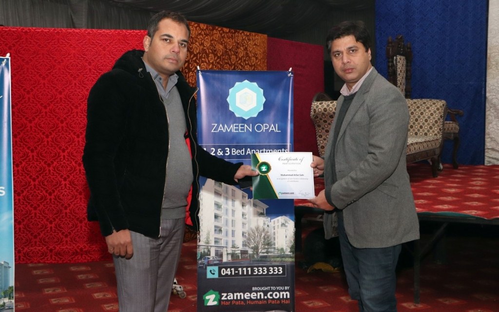 A participant receives his certificate