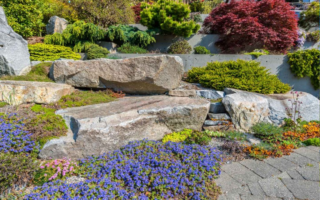 Multi-level landscaping goes well with front yard designs