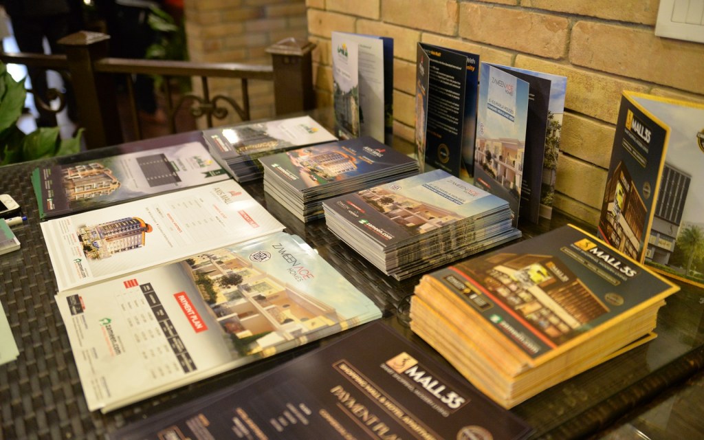 Various project brochures on display