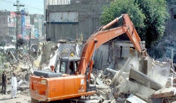 Town to take action against illegal buildings